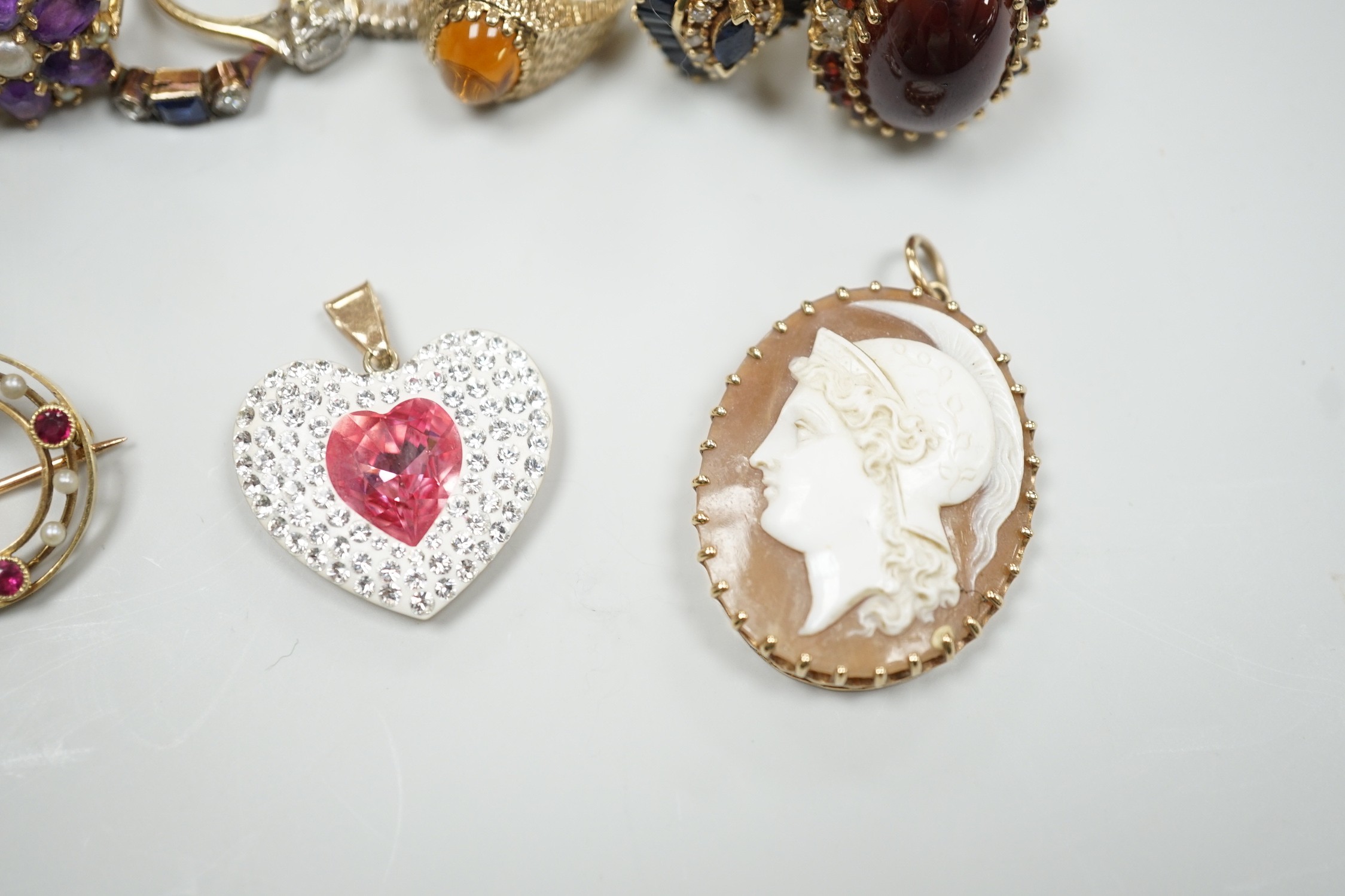 Eight assorted mainly modern 9ct gold and gem set dress rings, including amethyst and split pearl cluster, gross weight 30.7 grams, a 15ct, ruby and seed pearl set open work circular brooch, gross 2.6 grams, pair of 9ct,